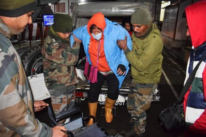 Image showing indian army rescuing stranded tourists in East Sikkim