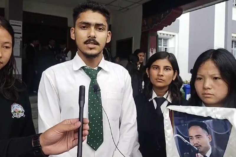 A photograph capturing the SRC members addressing the crowd during the rally, showcasing their role as representatives and leaders in the fight for justice.