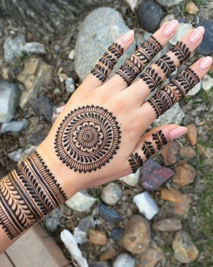 mehendi design back featuring an intricate mandala